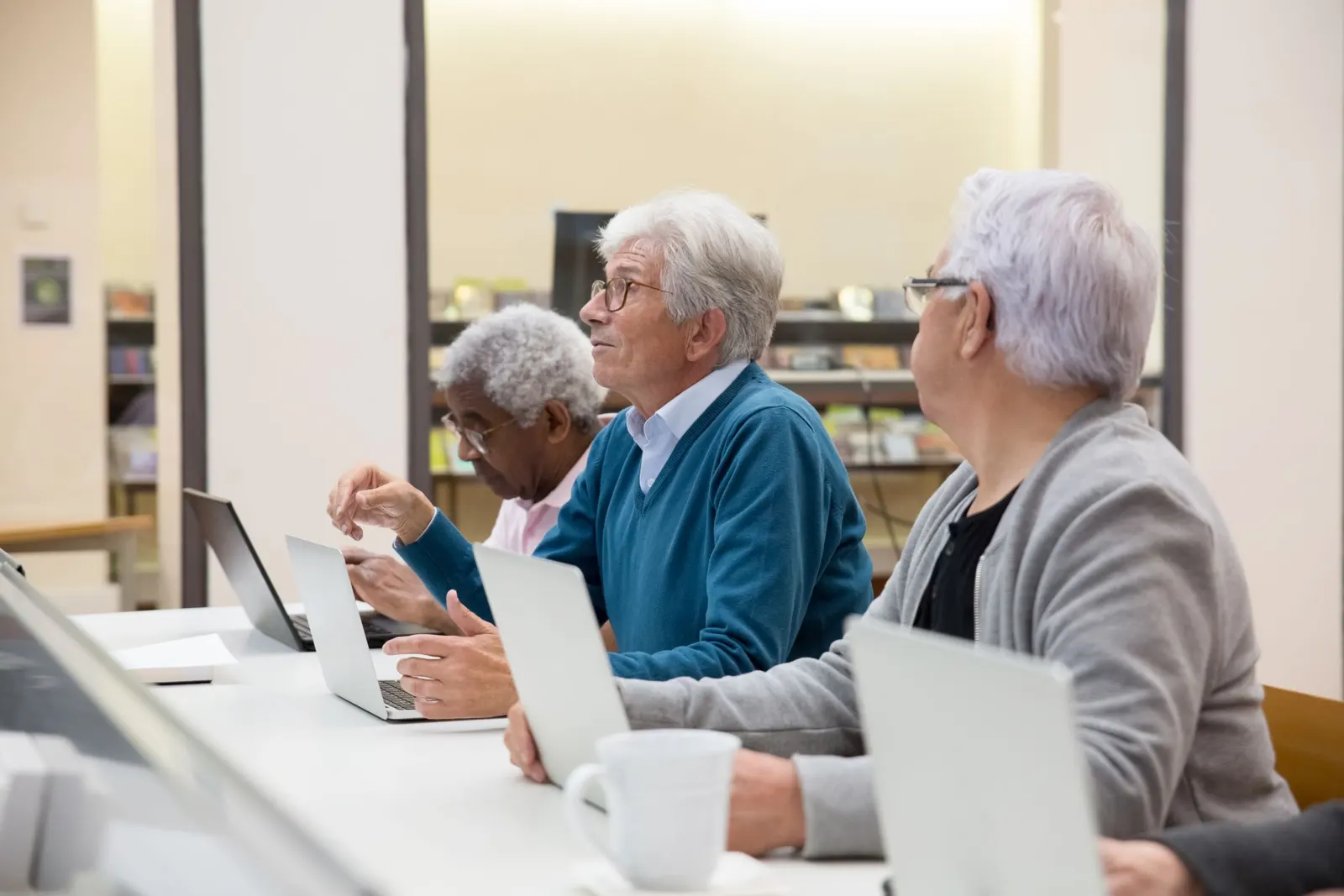Older adults taking part in a bright class